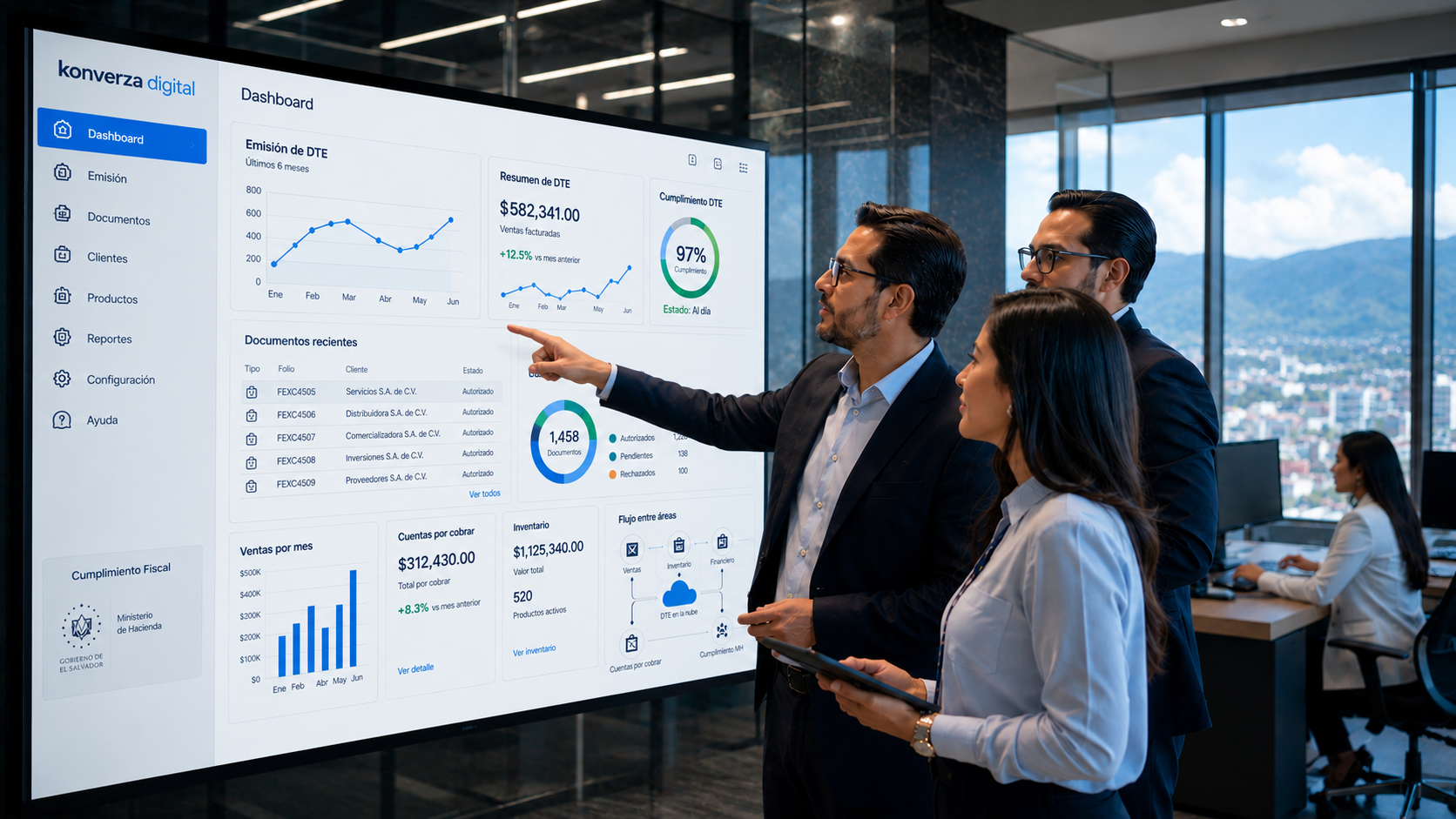 La facturación electrónica permite a las empresas acceder a información estratégica en tiempo real para mejorar la toma de decisiones. Equipo empresarial utilizando un sistema de facturación electrónica y gestión digital en El Salvador.